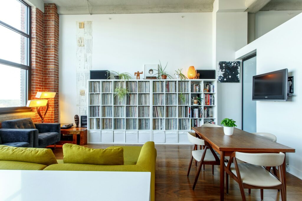 Open-plan loft apartment with tall windows