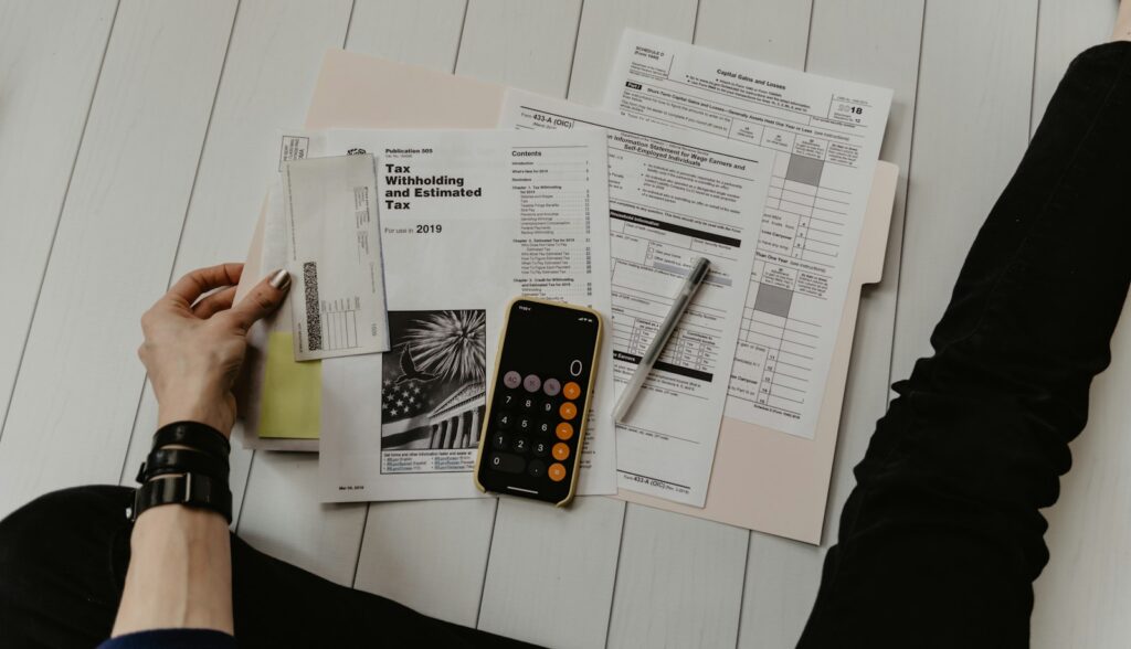 Mortgage paperwork and a calculator