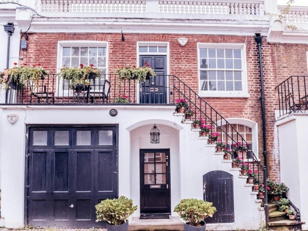 Brick townhouse with a small front garden in Riverside